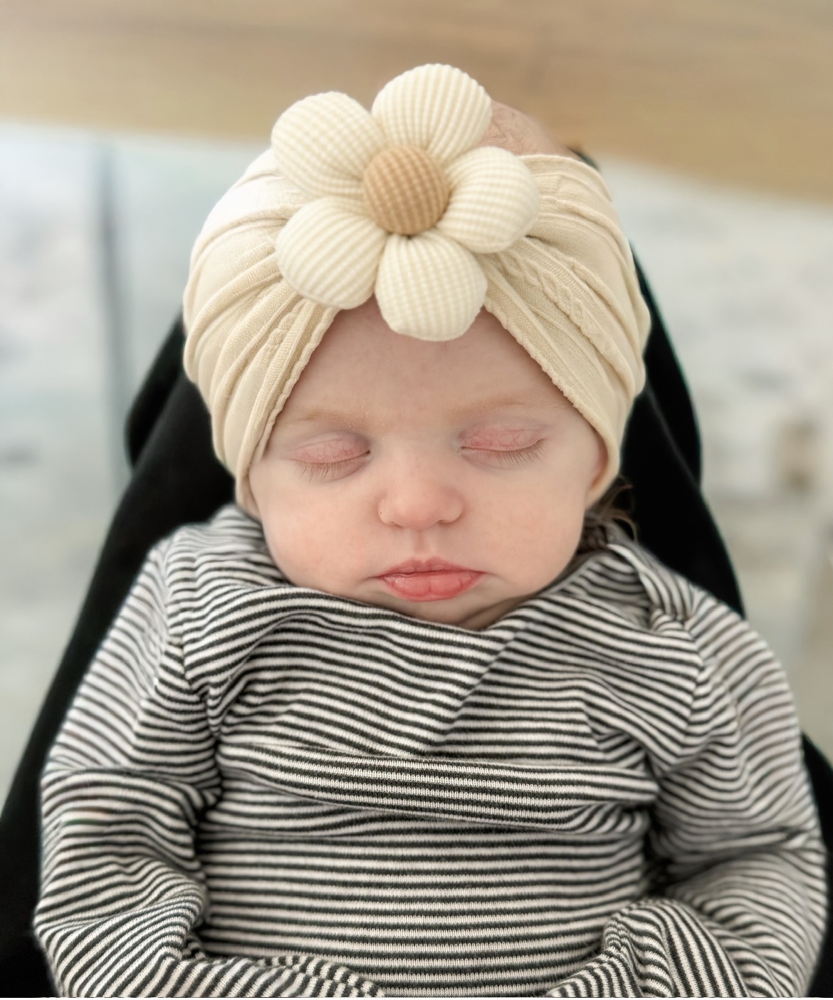 Newborn Delaney sleeping peacefully